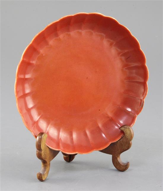 A Chinese coral red ground petal lobed saucer dish, Republic period, diameter 16.6cm, small restored chip to rim